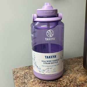 Takeya 64oz motivation water bottle. Purple